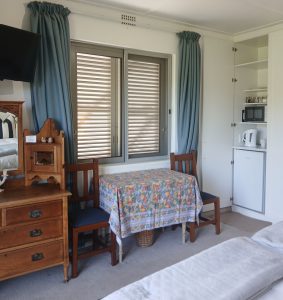 Guest room with table and chairs